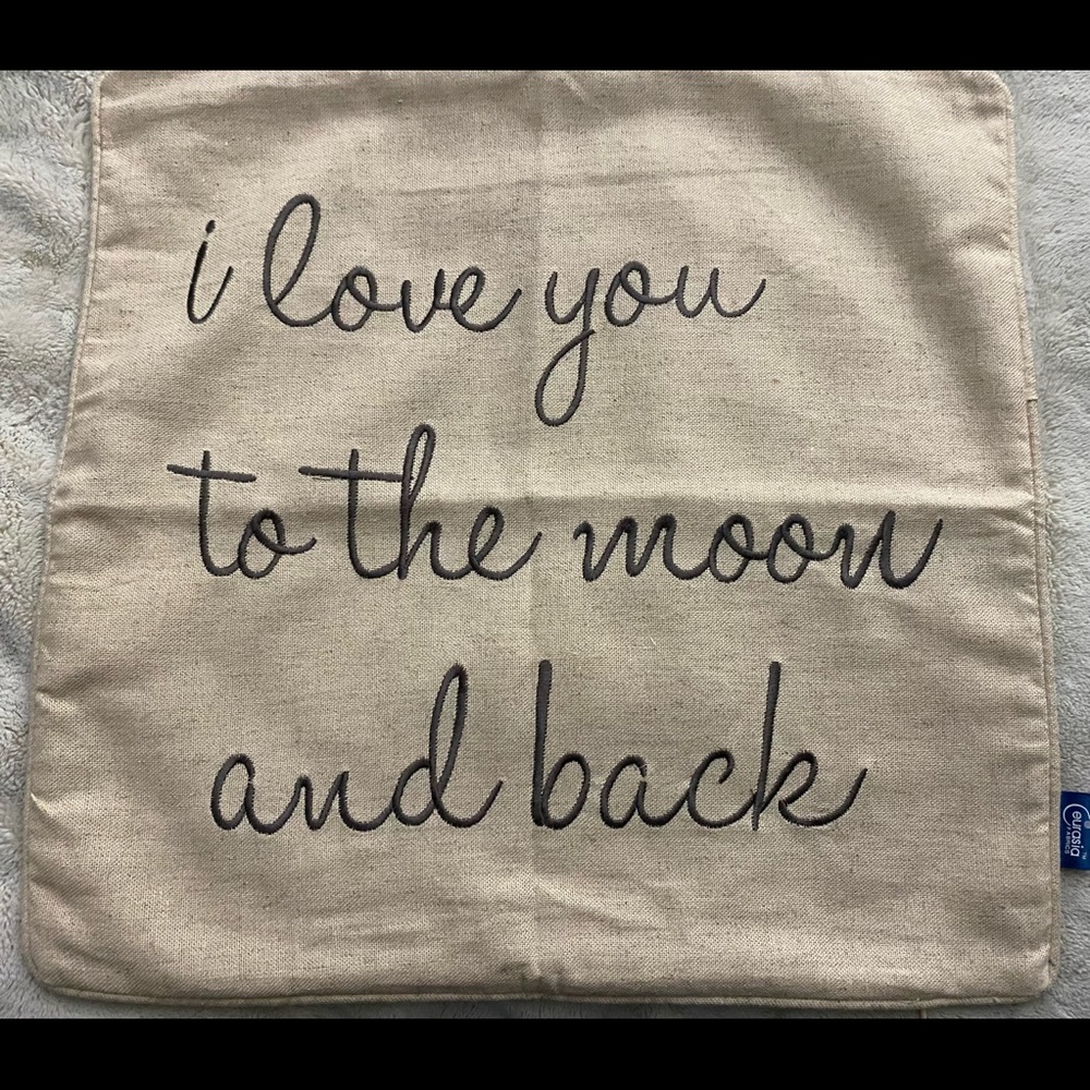 “I love you to the moon and back” throw pillow